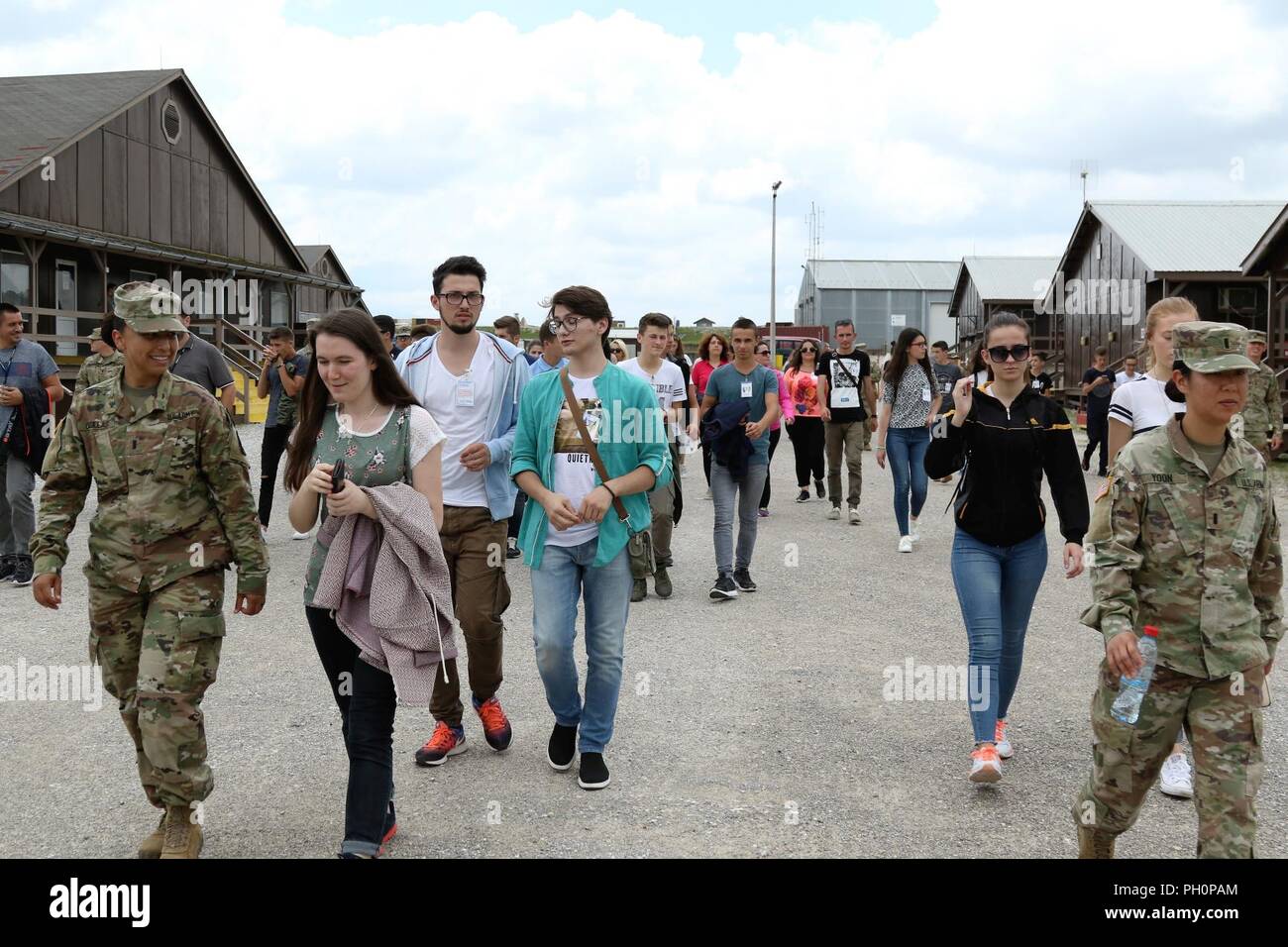 Albanian and Kosovar-Serbian youth tour Camp Bondsteel, Kosovo, on June 16. The visit came about as part of a NATO-appreciation initiative by the U.S. Embassy in Albania. Stock Photo