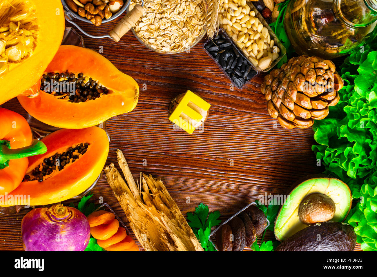 Foods containing and rich in vitamin E on a wooden board. Health food