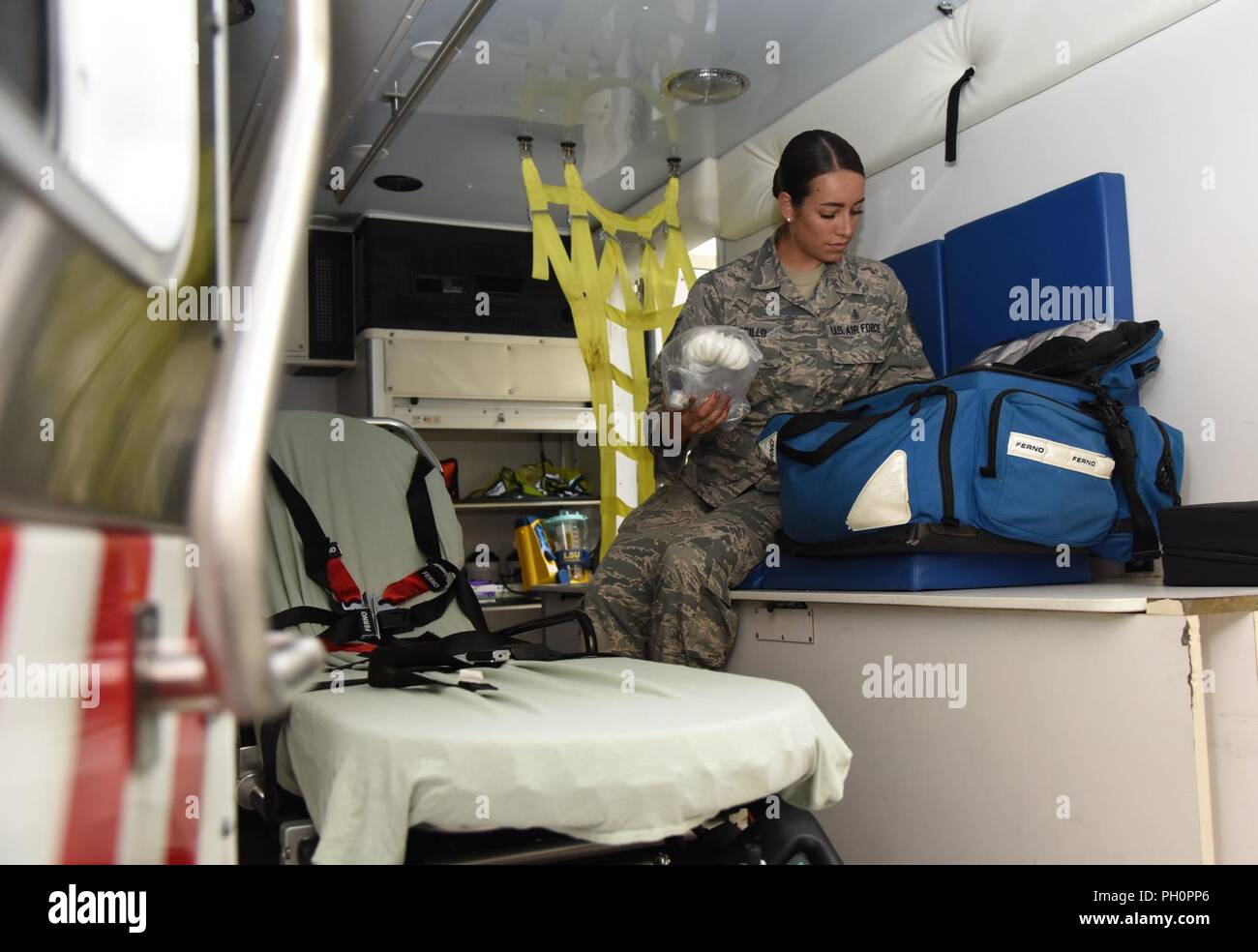 U.S. Air Force Tech. Sgt. Juliet Corcillo, 81st Medical Operations Squadron emergency room NCO in charge, conducts a daily function check inside an ambulance at Keesler Air Force Base, Mississippi, June 14, 2018. Corcillo will begin her first day of medical school July 6 with a four-year scholarship from the Air Force’s Health Professions Scholarship Program. Stock Photo