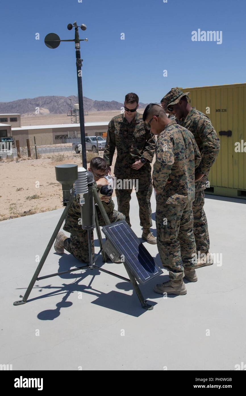 Meteorology And Oceanography Analyst Forecast Marines With Detachment A,  Marine Air Control Squadron 24, Marine Air Control Group 48, 4Th Marine  Aircraft Wing, Read Statistics On A Surface Weather Observation Station,  During