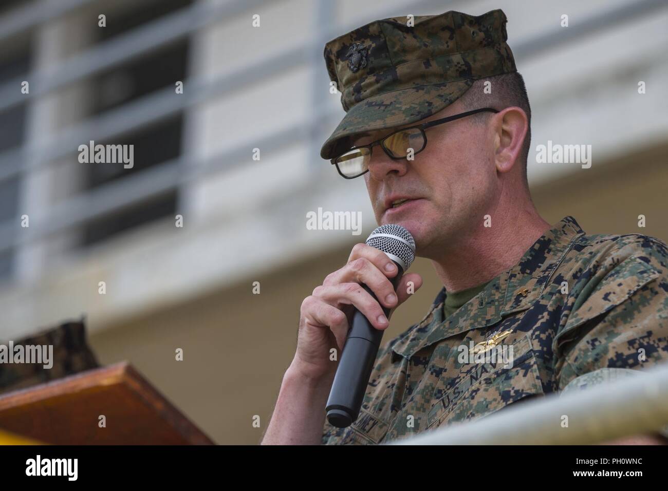 U.S. Navy Lt. Cmdr. Conrad T. Delaney, chaplain, 1st Light Armored Reconnaissance (LAR) Battalion (BN), 1st Marine Division, gives the invocation during the 1st LAR BN change of command ceremony at Marine Corps Base Camp Pendleton, Calif., June 21, 2018. The ceremony represents the official passing of authority from the offgoing commander, Lt. Col. Michael R. Nakonieczny, to the incoming commander, Lt. Col. Dominique B. Neal. Stock Photo
