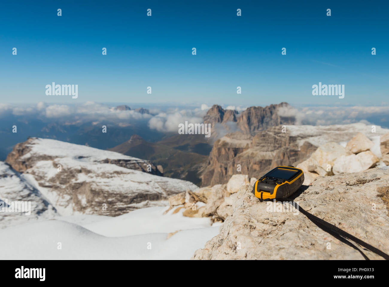 GPS navigator in hand Dolomites Alps Stock Photo