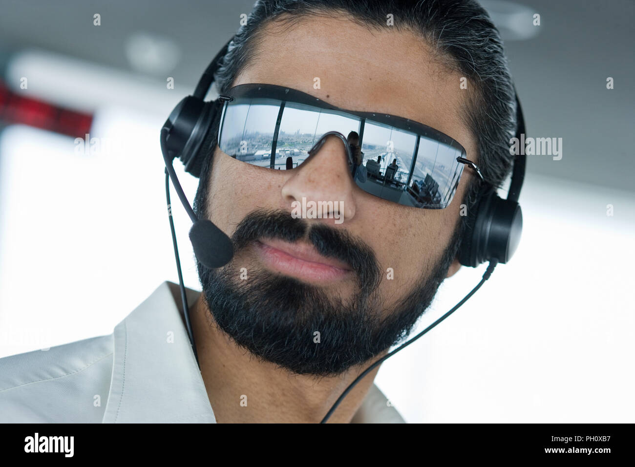 Muslim Airtraffic Controller at Dubai control tower Stock Photo