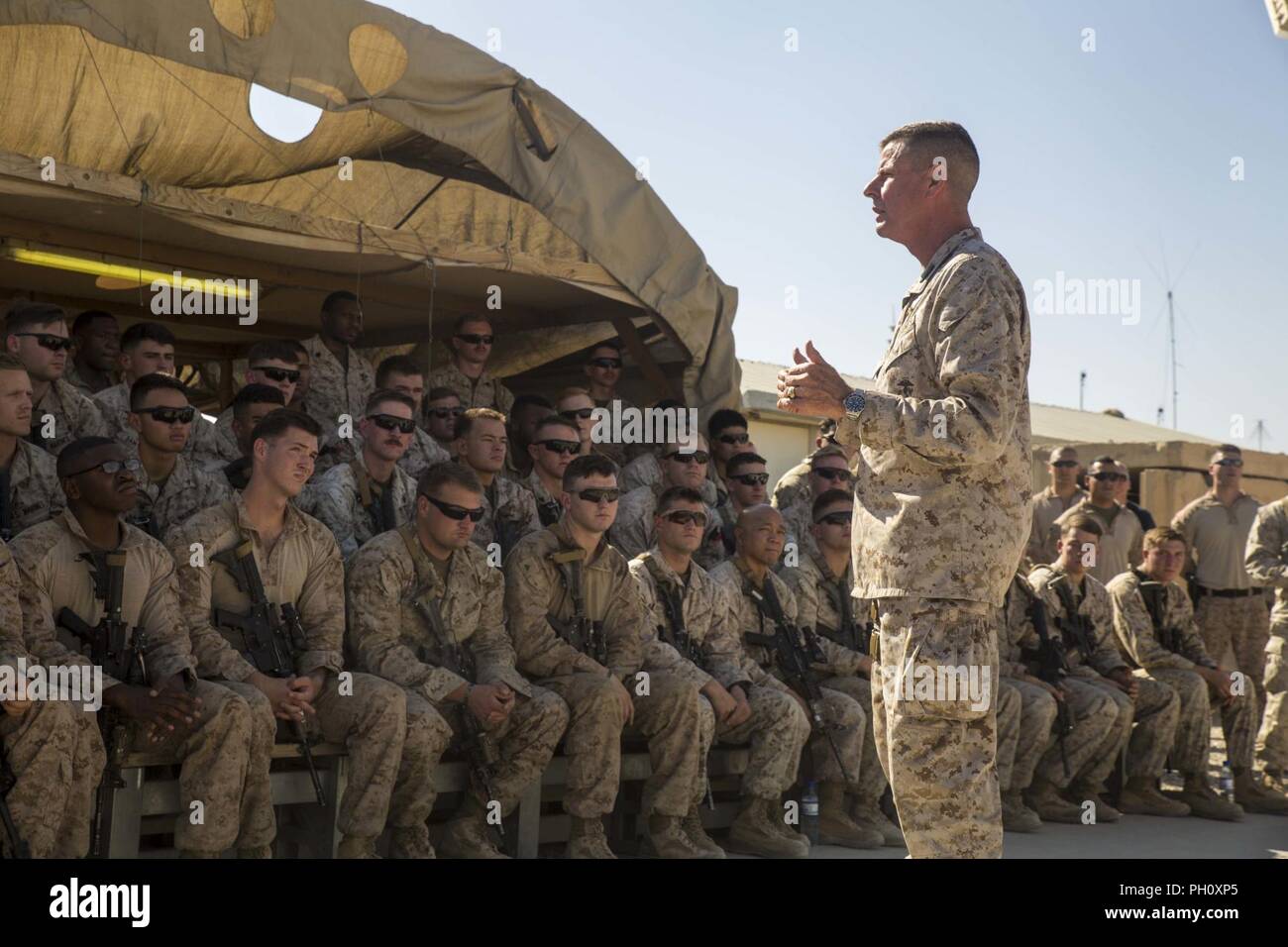 HELMAND PROVINCE, Afghanistan (June 19, 2018) - U.S. Marine Corps Lt. Gen. William D. Beydler, the commanding general for Marine Corps Forces Central Command, praises the service members with Task Force Southwest (TFSW) for their performance. Beydler visited Camp Shorab to show his appreciation to TFSW for the work they’ve done in Helmand Province. Stock Photo