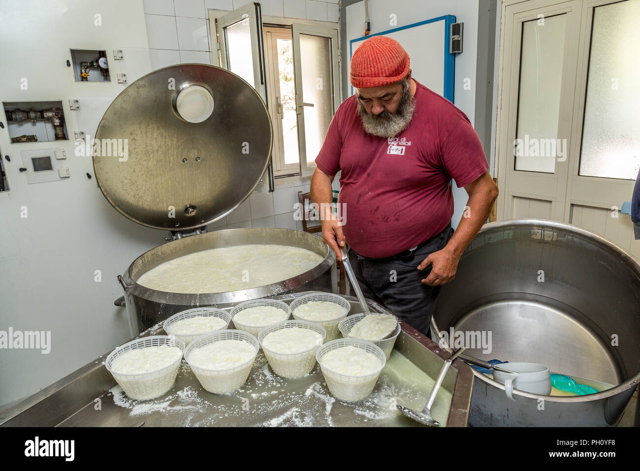 making ricotta cheese Stock Photo Alamy