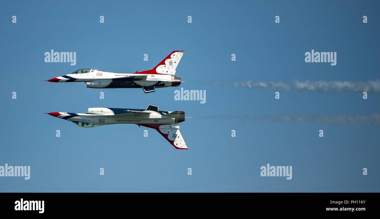 The U.S. Air Force Air Demonstration Squadron 'Thunderbirds' perform at the OC Air Show in Ocean City, MD, June 16, 2018. Since 1953, the Thunderbirds team has served as America’s premier air demonstration squadron, entrusted with the vital mission to recruit, retain and inspire past, present and future Airmen. Stock Photo