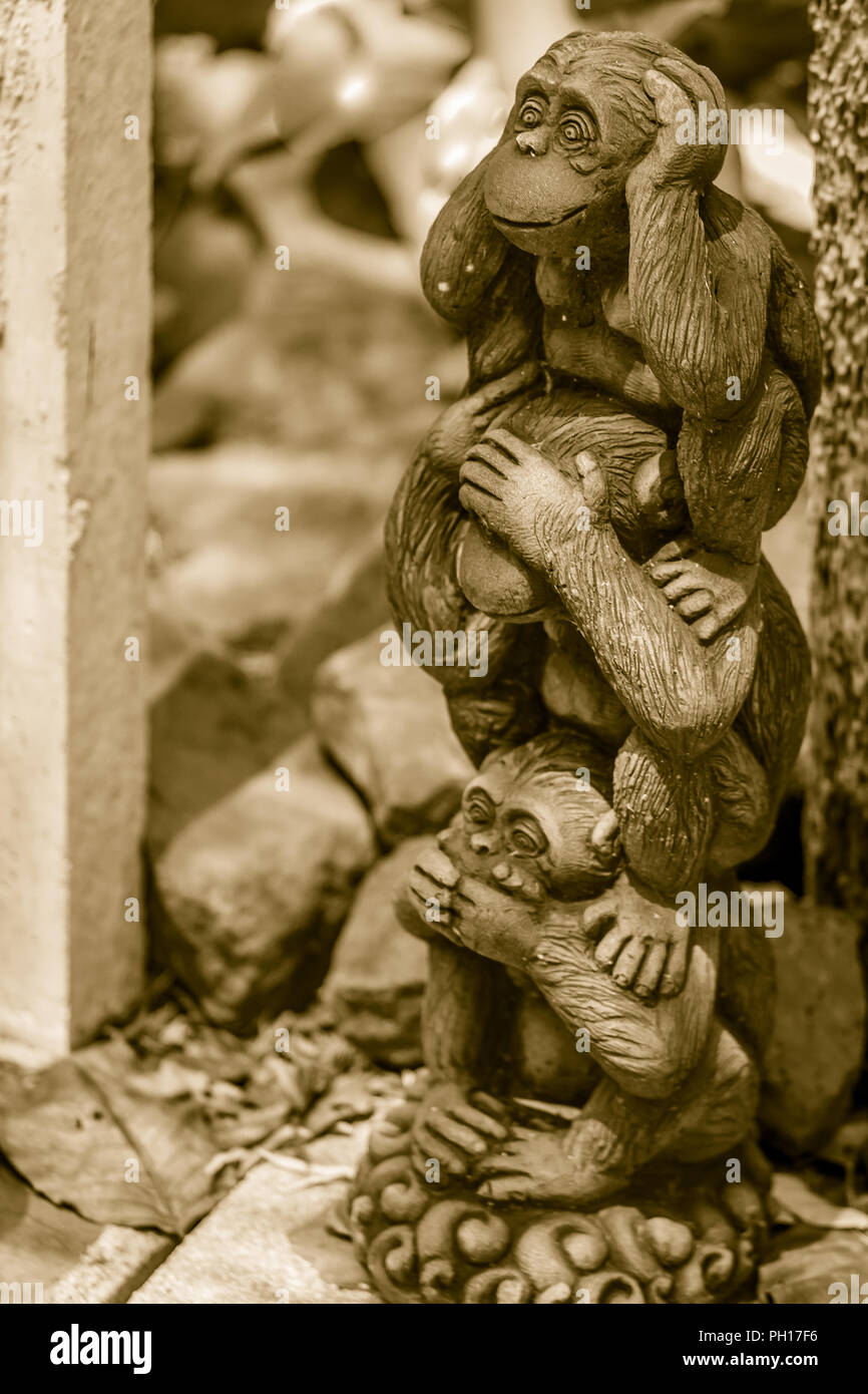 Three monkey dolls are molded using hand action close ears,eyes 