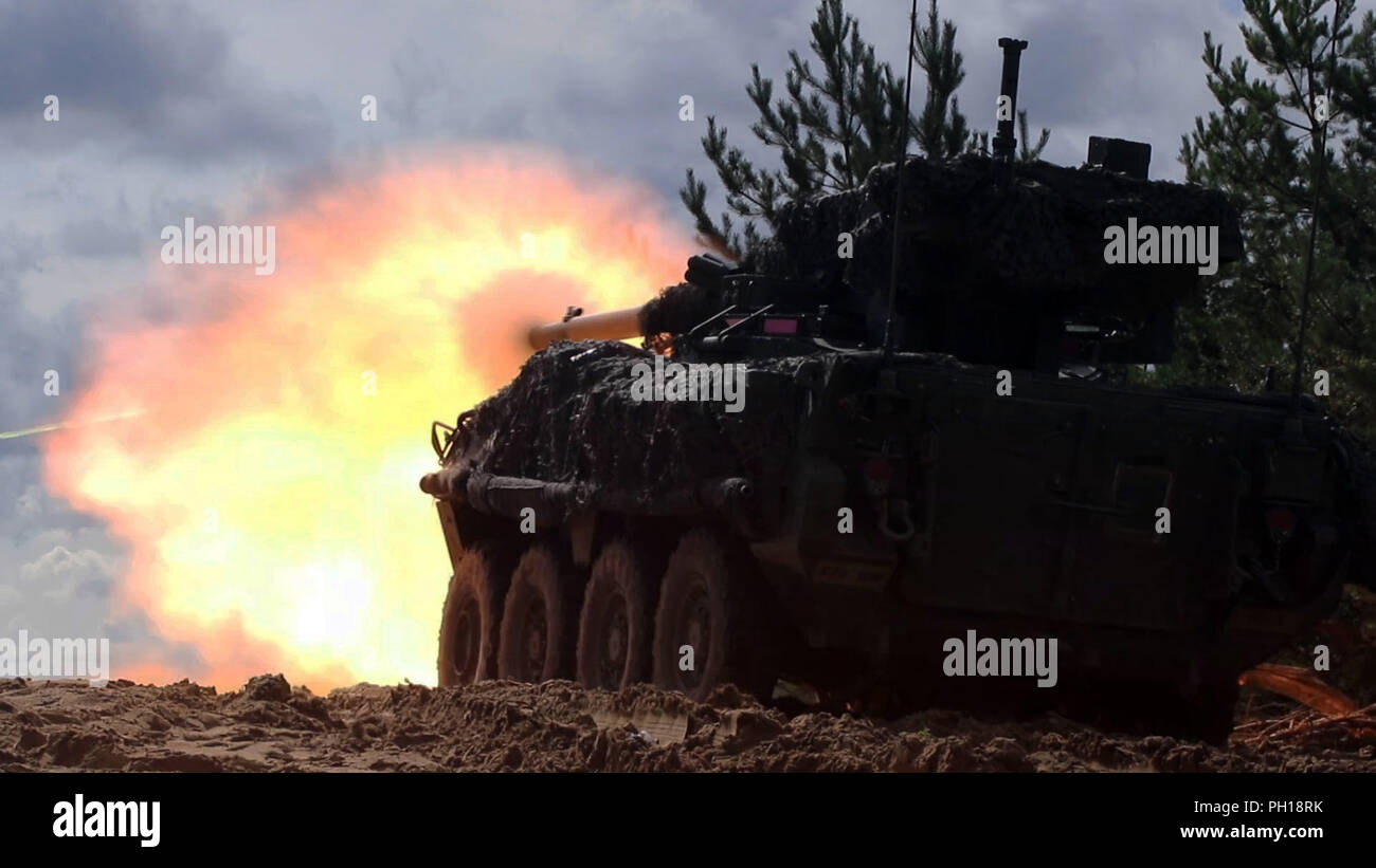 Stryker crewmen with the 1st Squadron, 2nd Cavalry Regiment fire an M1128 Mobile Gun System during a joint combined arms live fire exercise Aug. 26-30 at Bemowo Piskie Training Area, Poland. The CALFEX is designed to maintain readiness and build interoperability among BPTA Soldiers. The Soldiers are on a six-month rotational assignment in support of the multinational battle group comprised of U.S., U.K., Croatian and Romanian Soldiers who serve with the Polish 15th Mechanized Brigade as a defense and deterrence force in northeast Poland in support of NATO’s Enhanced Forward Presence at BPTA. ( Stock Photo