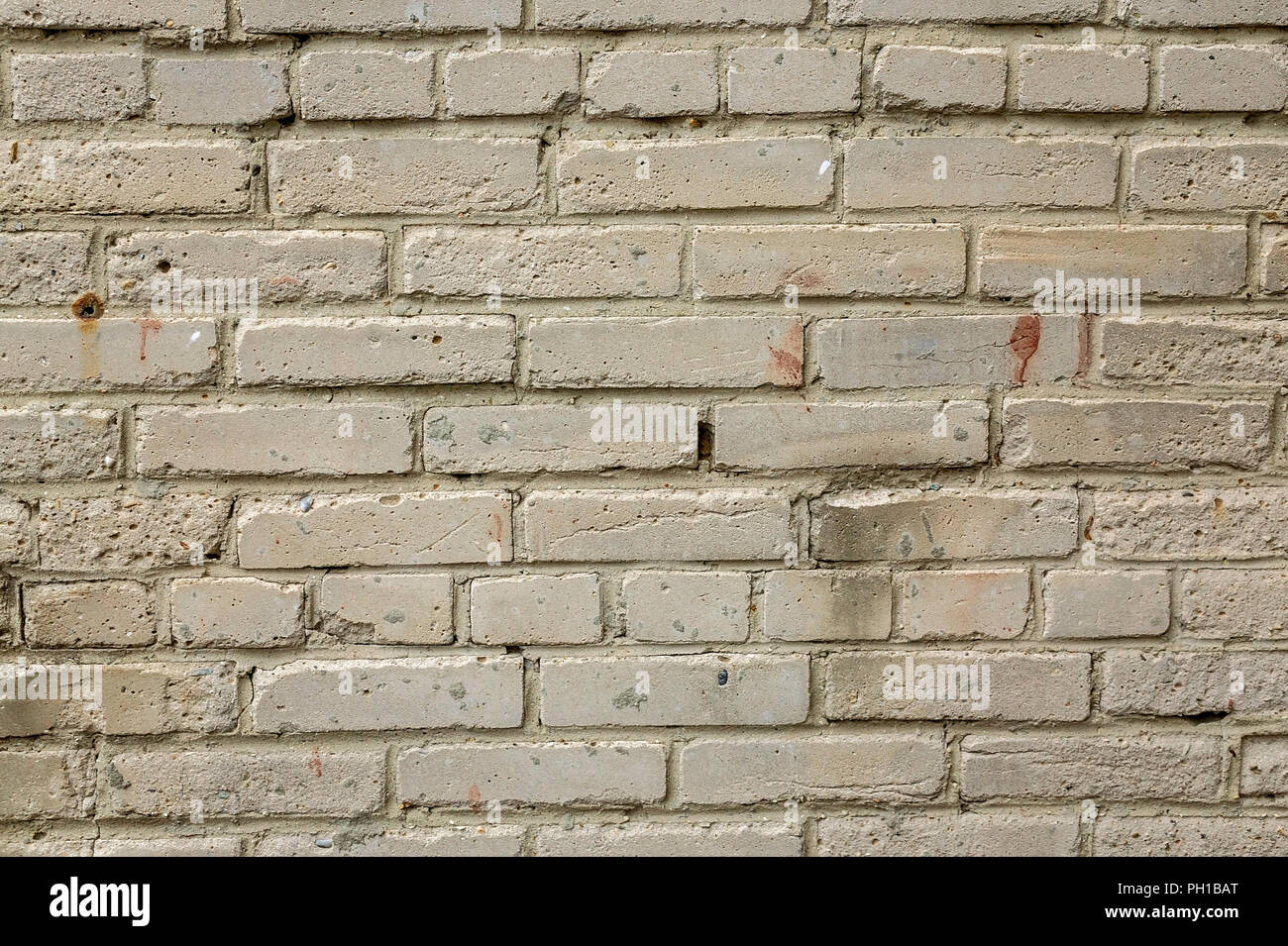 Old brick wall of silicate bricks. Texture Stock Photo