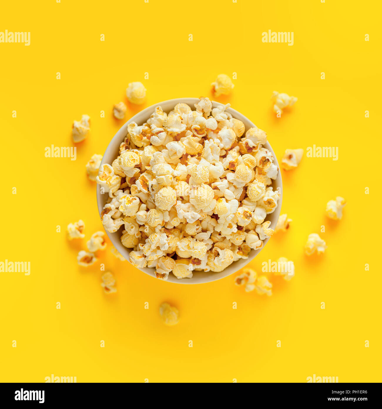 Download Popcorn In Paper Box On A Yellow Background Top View Stock Photo Alamy Yellowimages Mockups