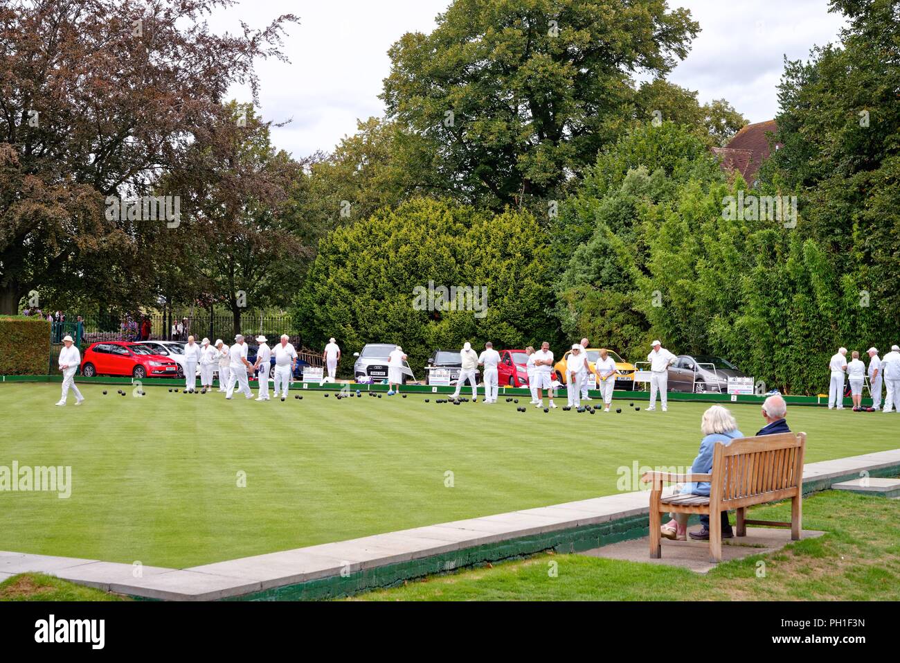 Games in progress at the Windsor Bowls Club on a summers afternoon, Windsor Berkshire England UK Stock Photo