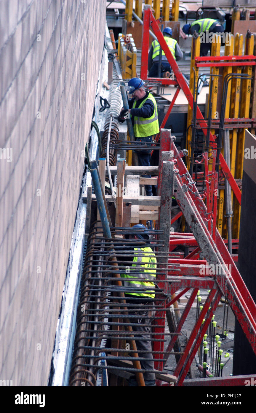 Metal Rods In Wall Builders fixing metal rods into wall before concrete pouring in the ...