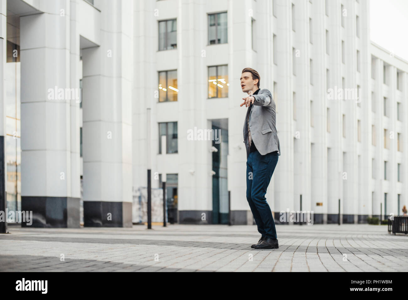Excited business man dancing city hi-res stock photography and images ...