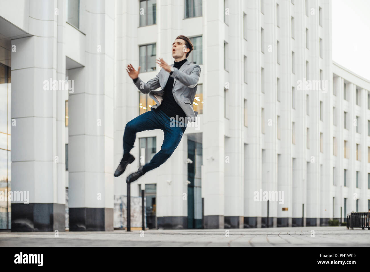 Excited business man dancing city hi-res stock photography and images ...