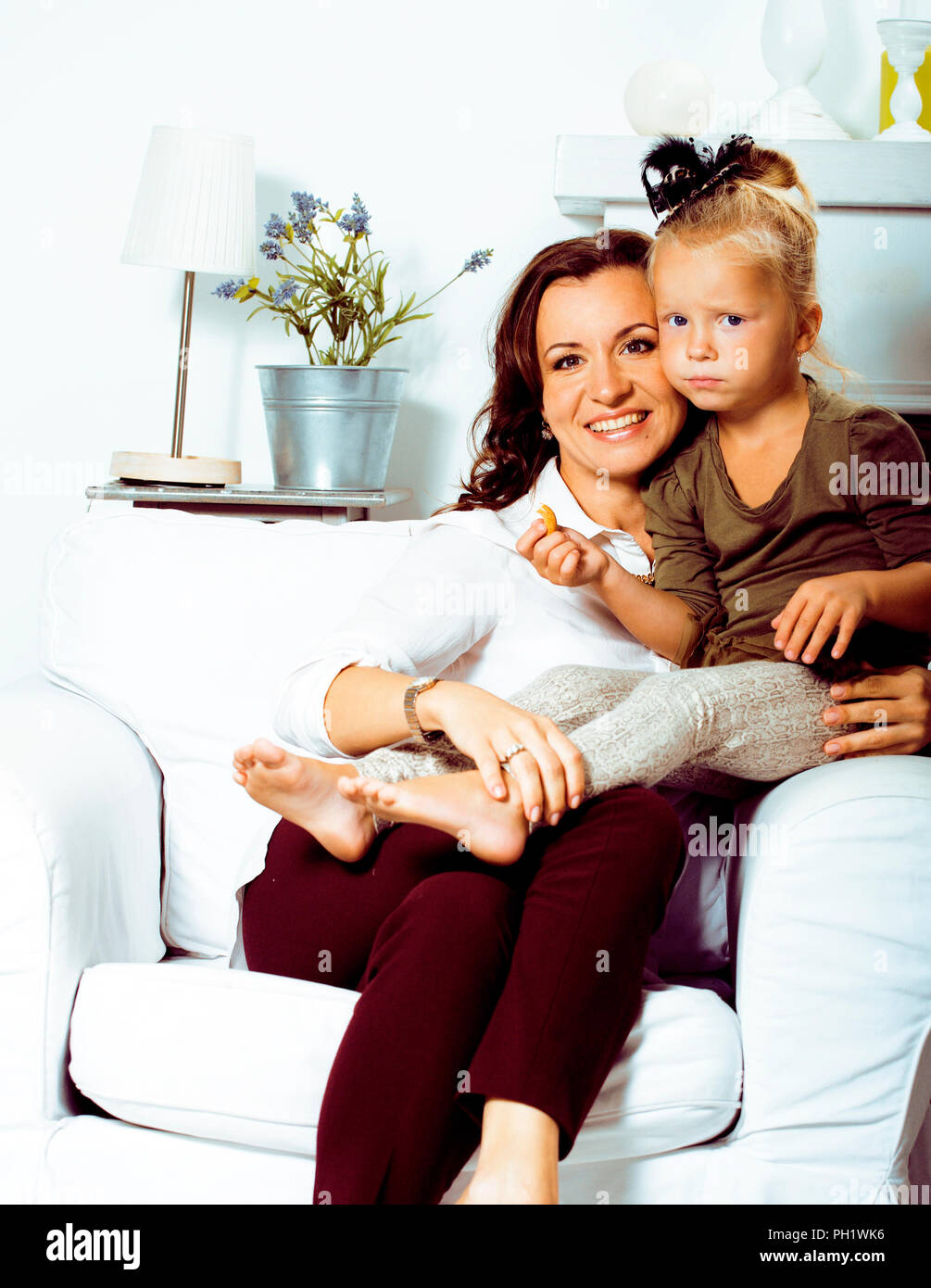 happy smiling mother with little cute daughter at home interior, Stock Photo