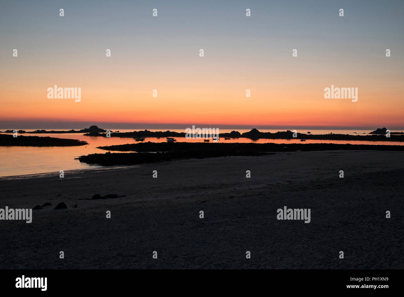 Sunset at Cobo Bay, Guernsey, Channel Islands Stock Photo - Alamy