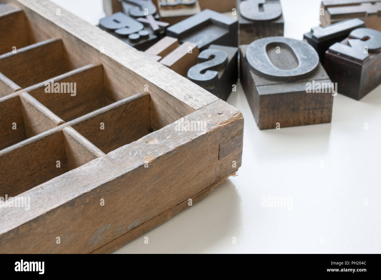 Wooden Letterpress Blocks white background Stock Photo