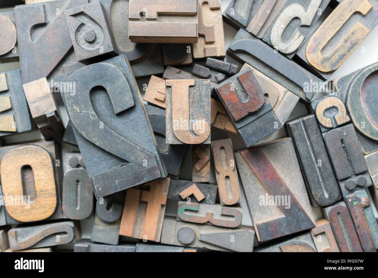 Wooden Letterpress Blocks white background Stock Photo