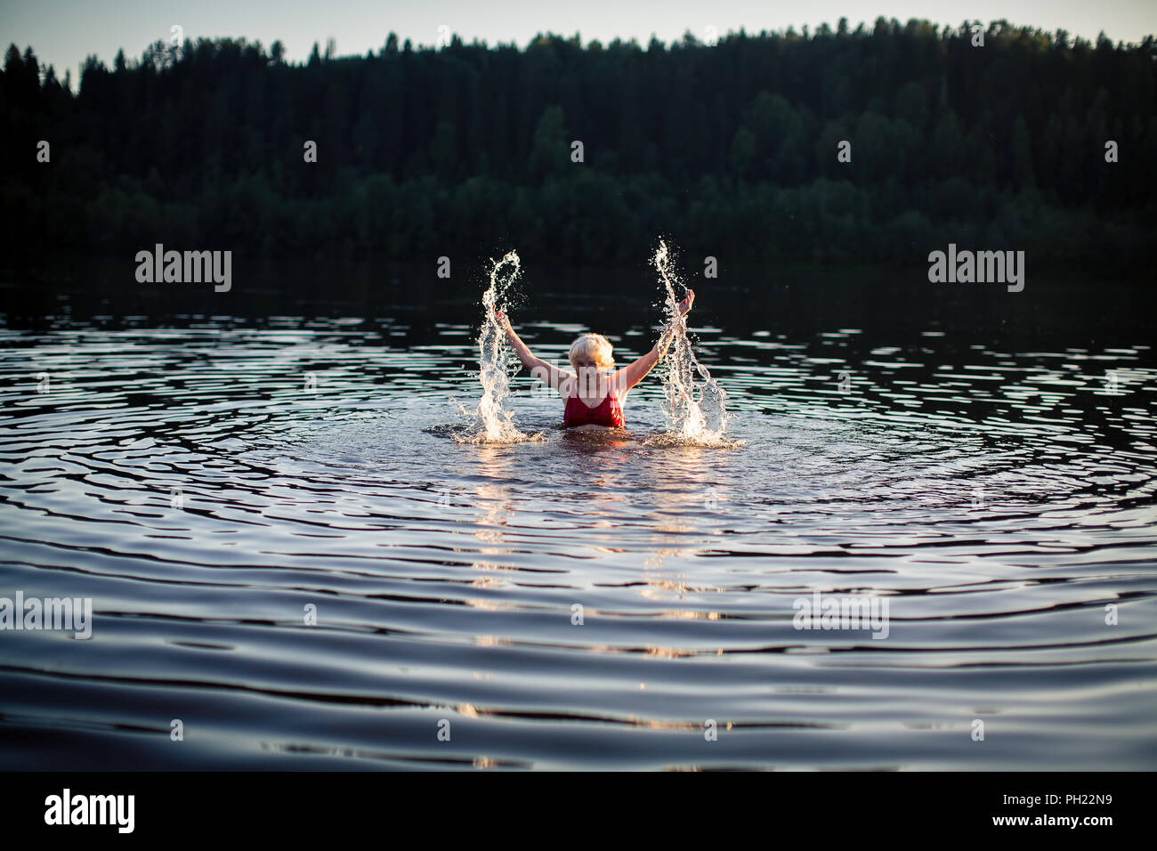 Elderly woman swimming hi-res stock photography and images - Alamy