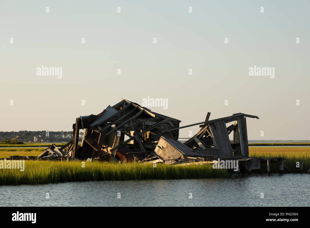 Ruins of an abandoned cabin in a salt marsh on Chincoteague Island, Virginia, USA. Stock Photo