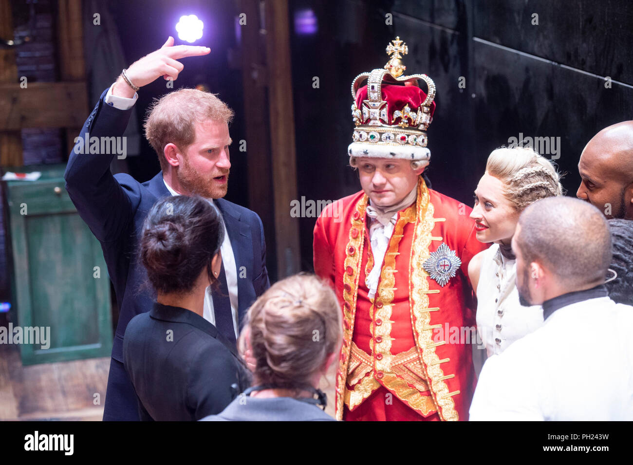 The Duke of Sussex meeting the cast at the Victoria Palace Theatre