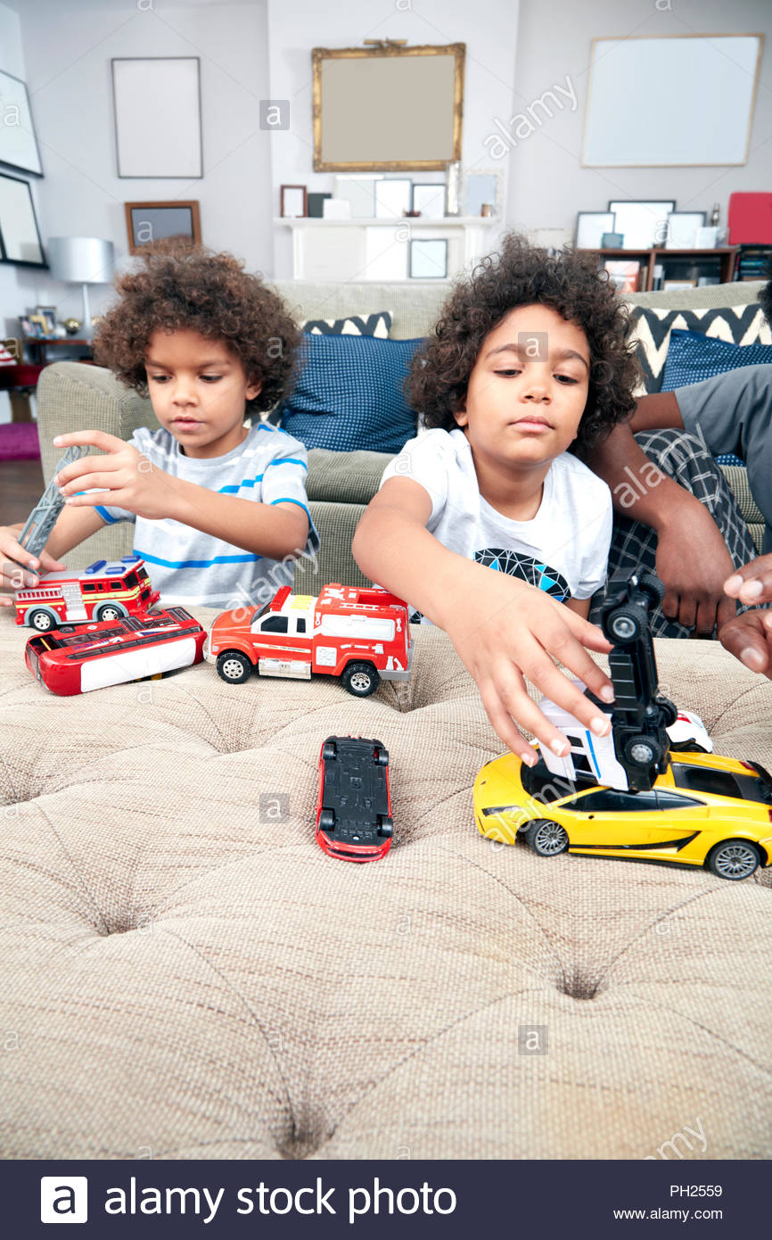 boys playing with cars