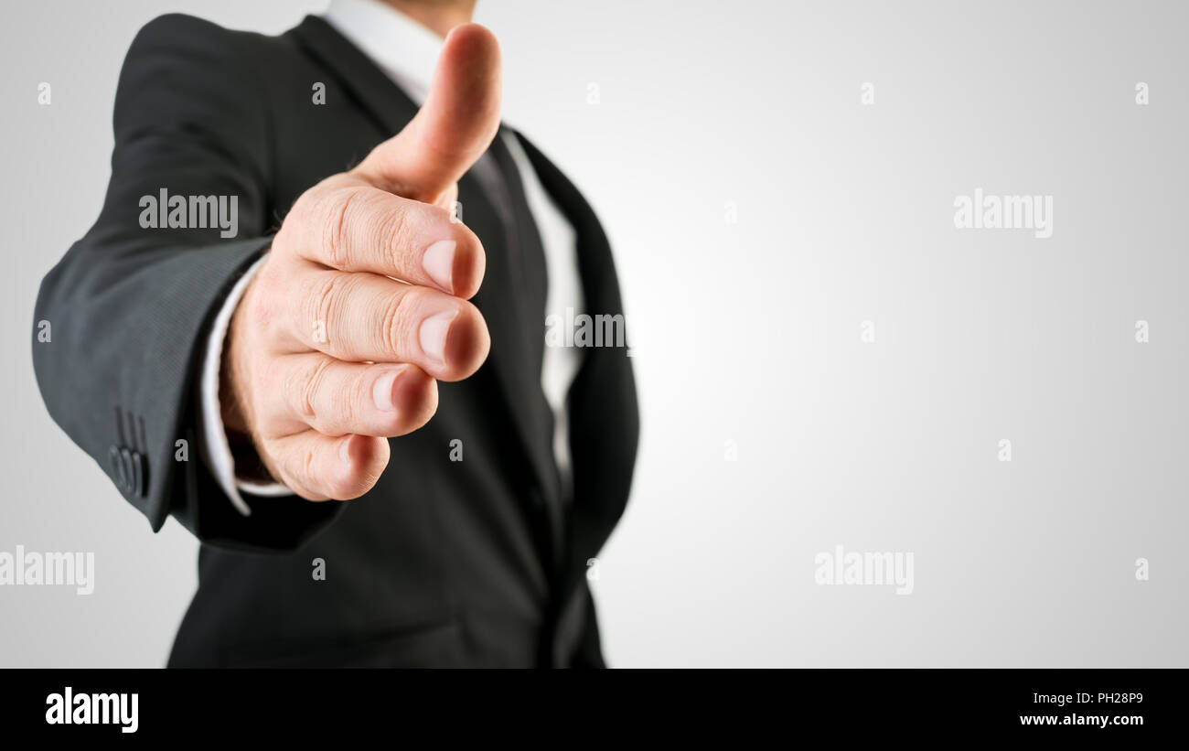 Businessman in Black Suit Showing Handshake Gesture in Close up ...