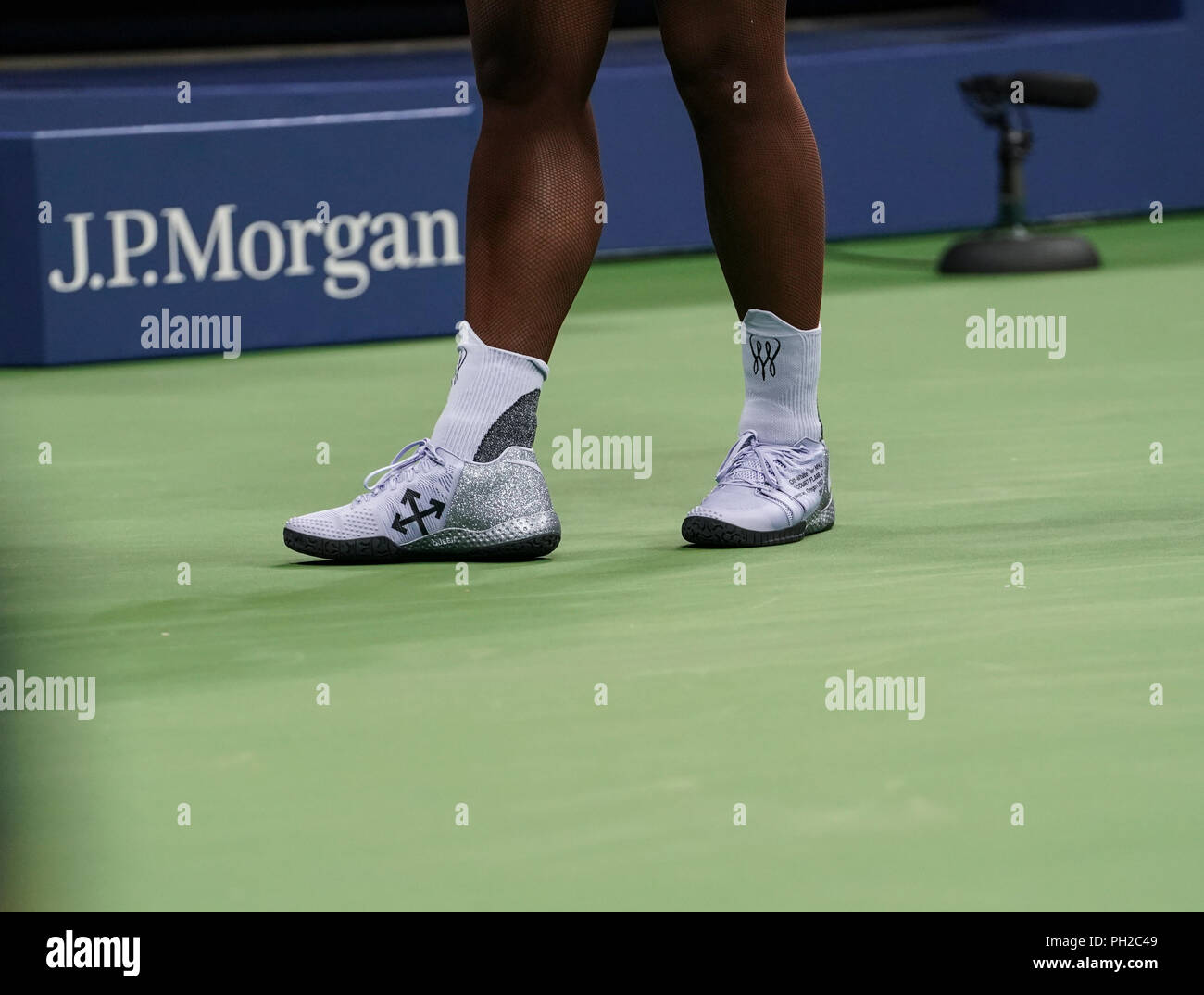 New York, USA - August 29, 2018: Serena Williams of USA wearing shoes Off  White by Nike Court Flare 2 during US Open 2018 2nd round match against  Carina Witthoeft of GermaUSA