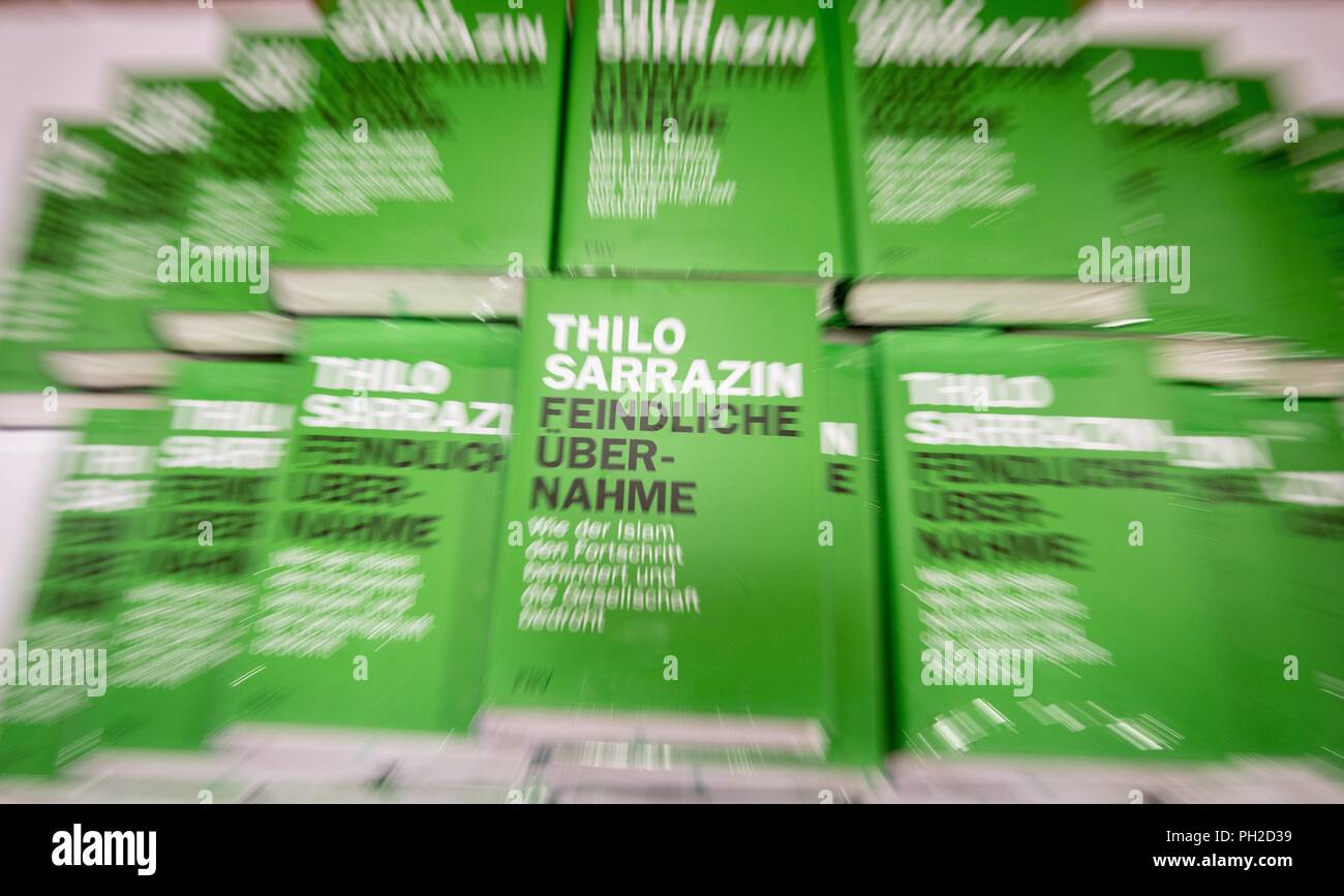 Germany, Berlin. 30th Aug, 2018. Copies of Thilo Sarrazin's book 'Enemy Takeover - How Islam hinders progress and threatens society' lie before the official presentation at the press conference in the conference centre of the Federal Press Conference. (Shot with zoom effect. Credit: Kay Nietfeld/dpa/Alamy Live News Stock Photo