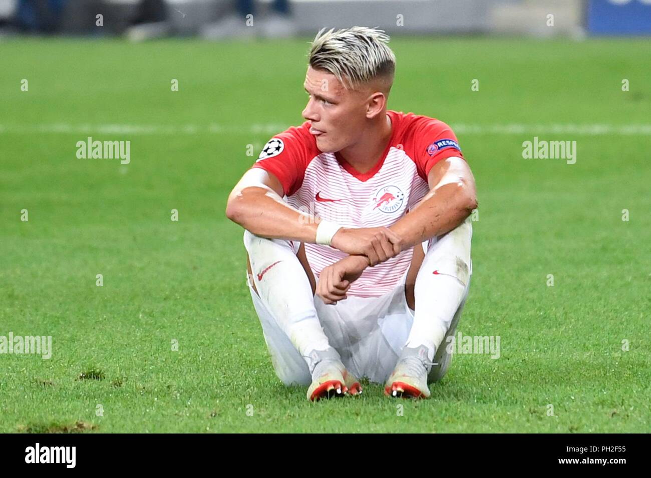 Salzburg, Austria August 29, 2018: CL - Quali - 18/19 - RB Salzburg Vs. Red Star Belgrade Hannes Wolf (FC Salzburg), sitting on ground, action/single image/cut out/dissatisfied/disappointed/disappointed/dejected/frustratedriert/| Stock Photo