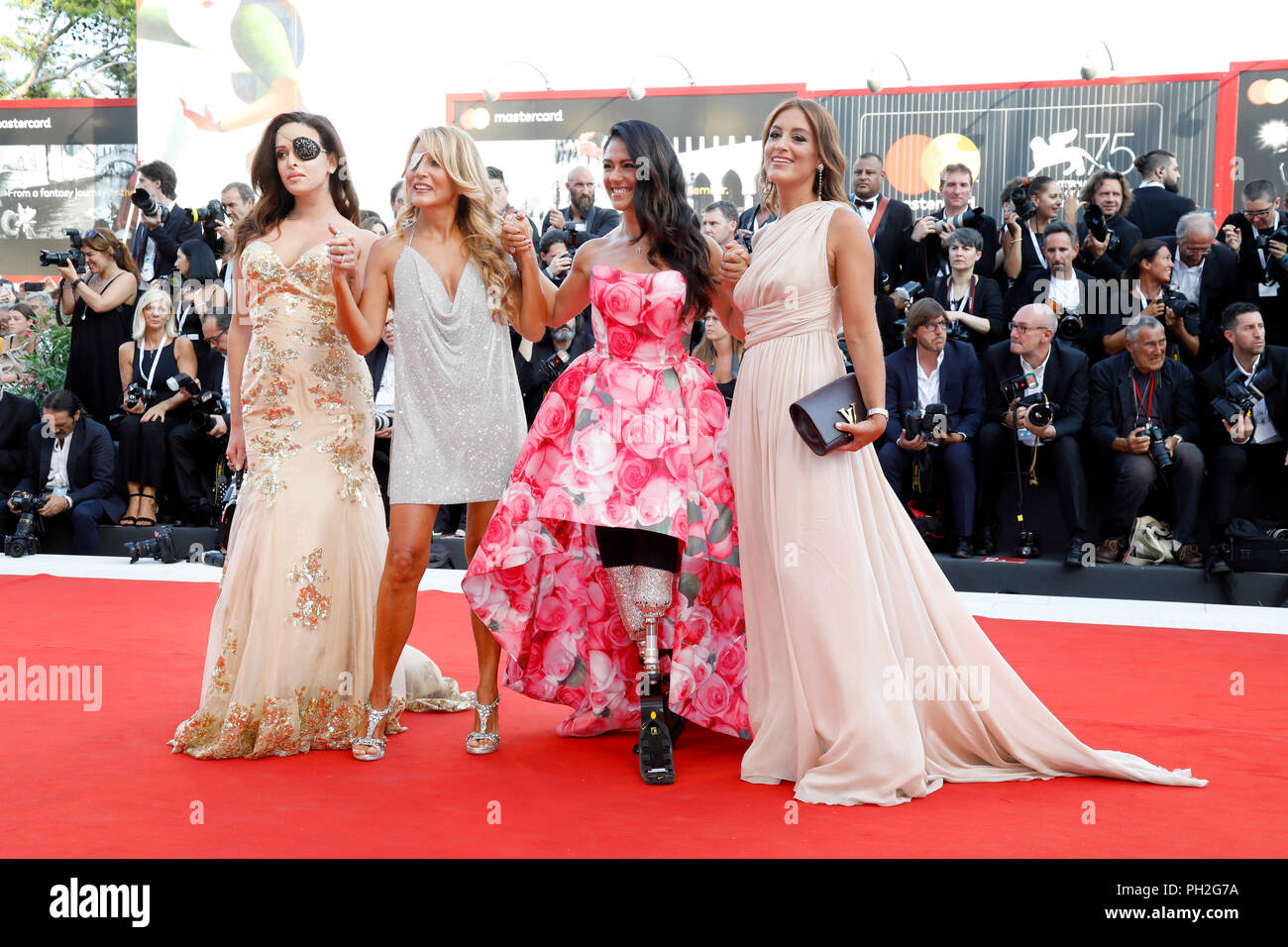 Venice, Italy. 29th Aug, 2018. Gessica Notaro, Jo Squillo, Giusy Versace and guest attend the 'First Man' premiere and opening of the 75th Venice Film Festival at the Palazzo del Cinema on August 29, 2018 in Venice, Italy. Credit: John Rasimus/Media Punch ***France, Sweden, Norway, Denark, Finland, Usa, Czech Republic, South America Only***/Alamy Live News Stock Photo