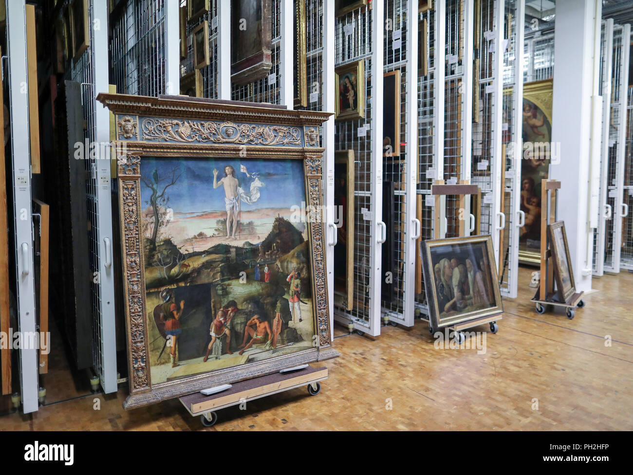 Berlin, Germany. 30th Aug, 2018. 30.08.2018, Berlin: Giovanni Bellini's painting 'The Resurrection of Christ' (1475) is prepared for transport to London in the depot of the National Museums in Berlin. An exhibition shown in Berlin and London is dedicated to the work of the two Renaissance artists Giovanni Bellini (c. 1435-1516) and Andrea Mantegna (c. 1431-1506). For the show, the National Museums in Berlin and the National Gallery in London are cooperating with the British Museum. Credit: Jens Büttner/dpa-Zentralbild/dpa/Alamy Live News Stock Photo