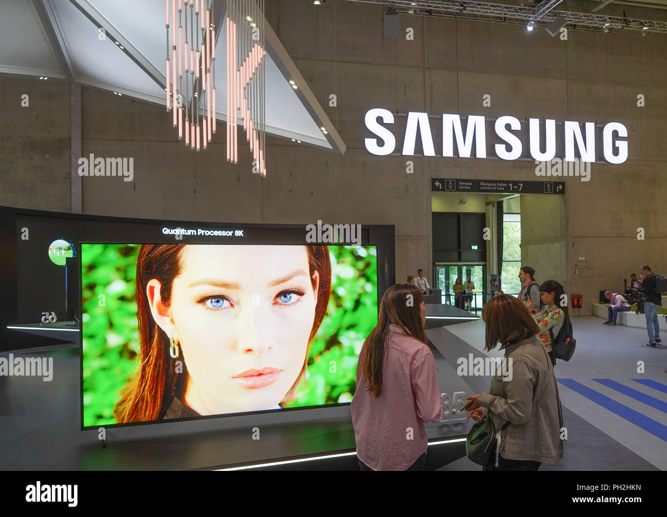 Berlin, Germany. 30th Aug, 2018. 30.08.2018, Berlin: The latest QLED 8K televisions will be presented at the stand of the electronics group Samsung on the 2nd press day of the electronics trade fair IFA. Credit: Jörg Carstensen/dpa/Alamy Live News Stock Photo