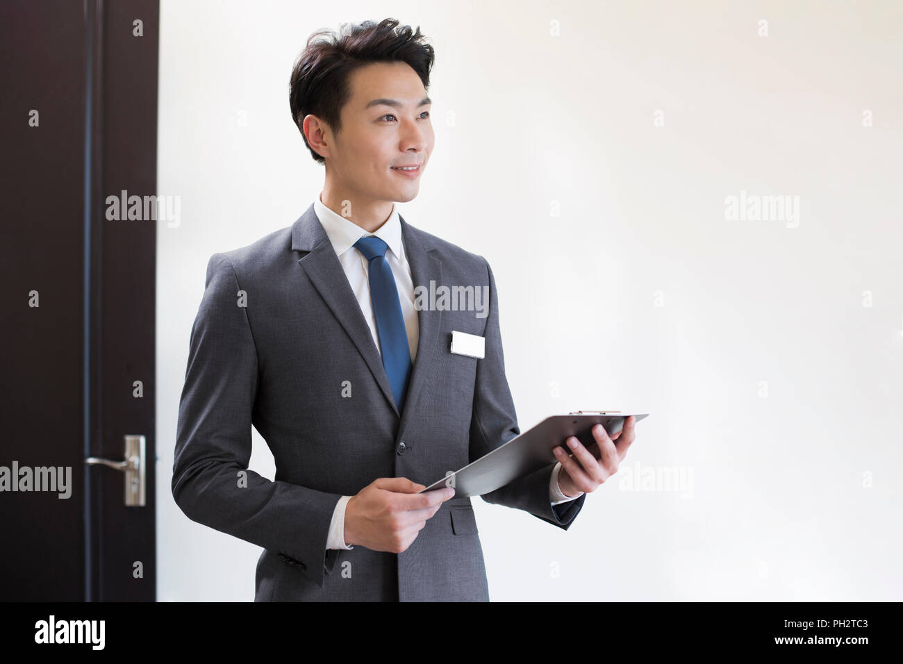 Confident male realtor Stock Photo Alamy