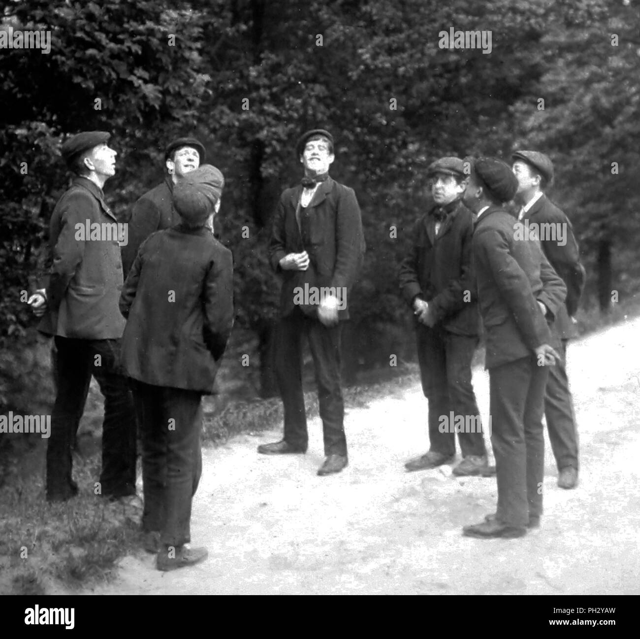 Men playing toss and pitch, Victorian period Stock Photo