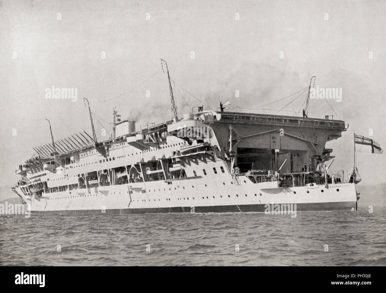 HMS Courageous.  One of the 'hush-hush' ships of the British Royal Navy during WWI, she was later converted into a aircraft carrier.  From The Book of Ships, published c.1920. Stock Photo