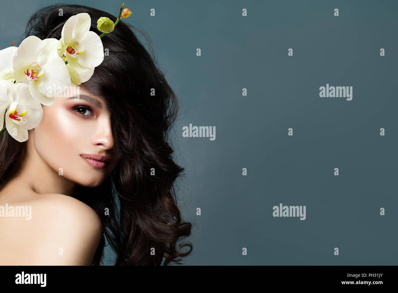 Beautiful Brunette Woman With Healthy Skin Dark Wavy Hair And