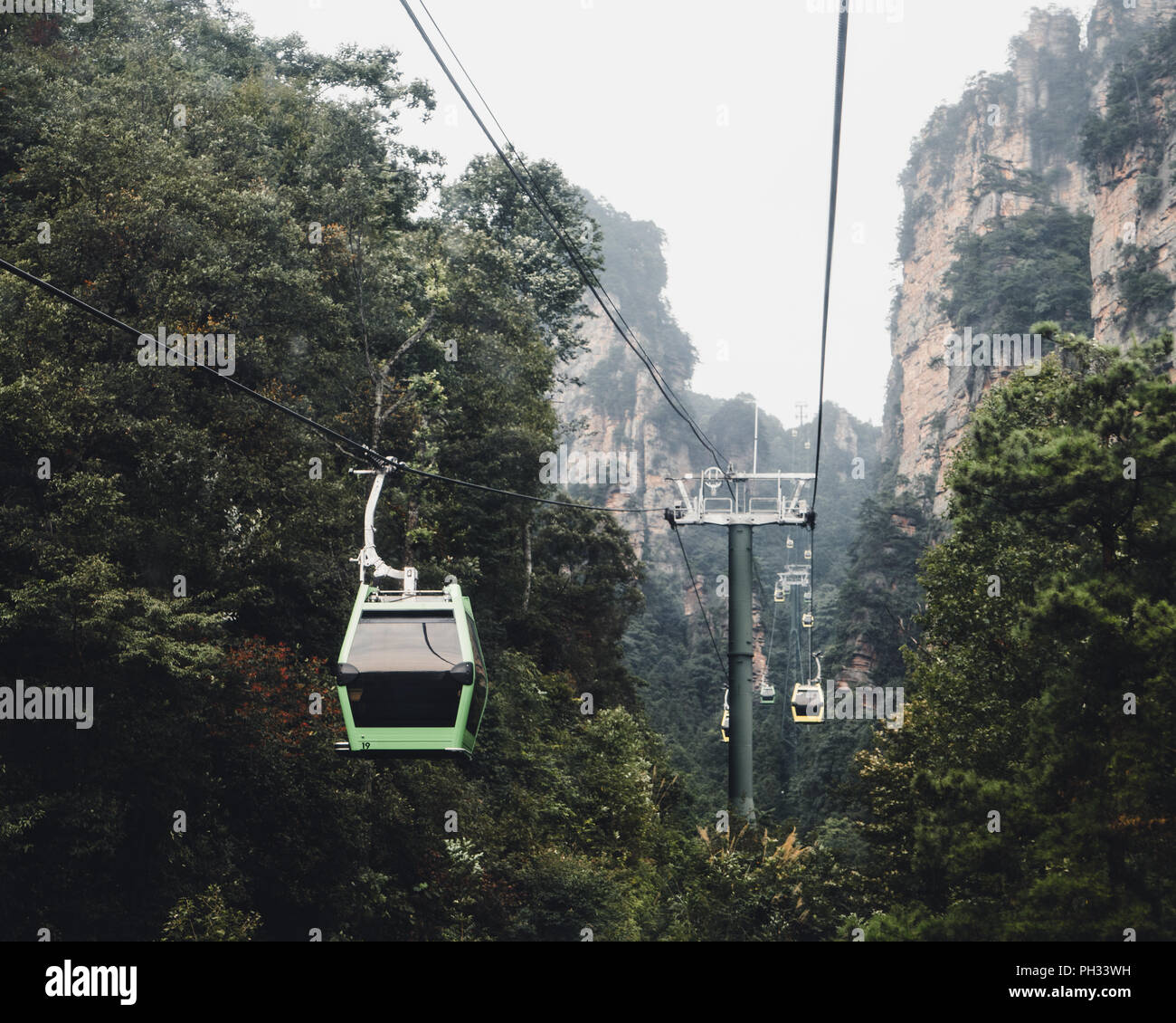 Cable cars in the middle of mountains in Zhangjiajie, Hunan, China Stock Photo