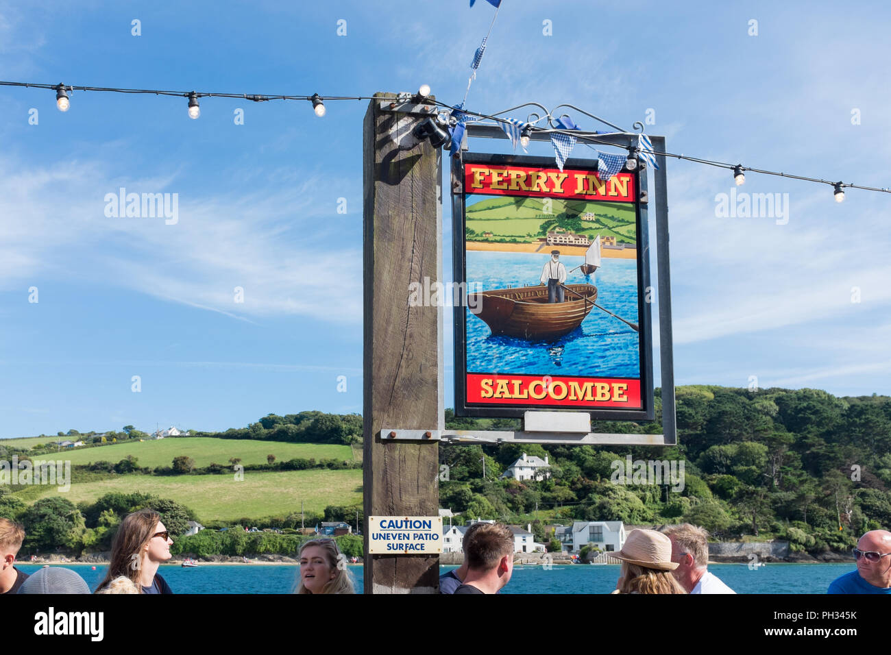Colourful sign for the Ferry Inn waterfront pub in the pretty Devon sailing town of Salcombe Stock Photo
