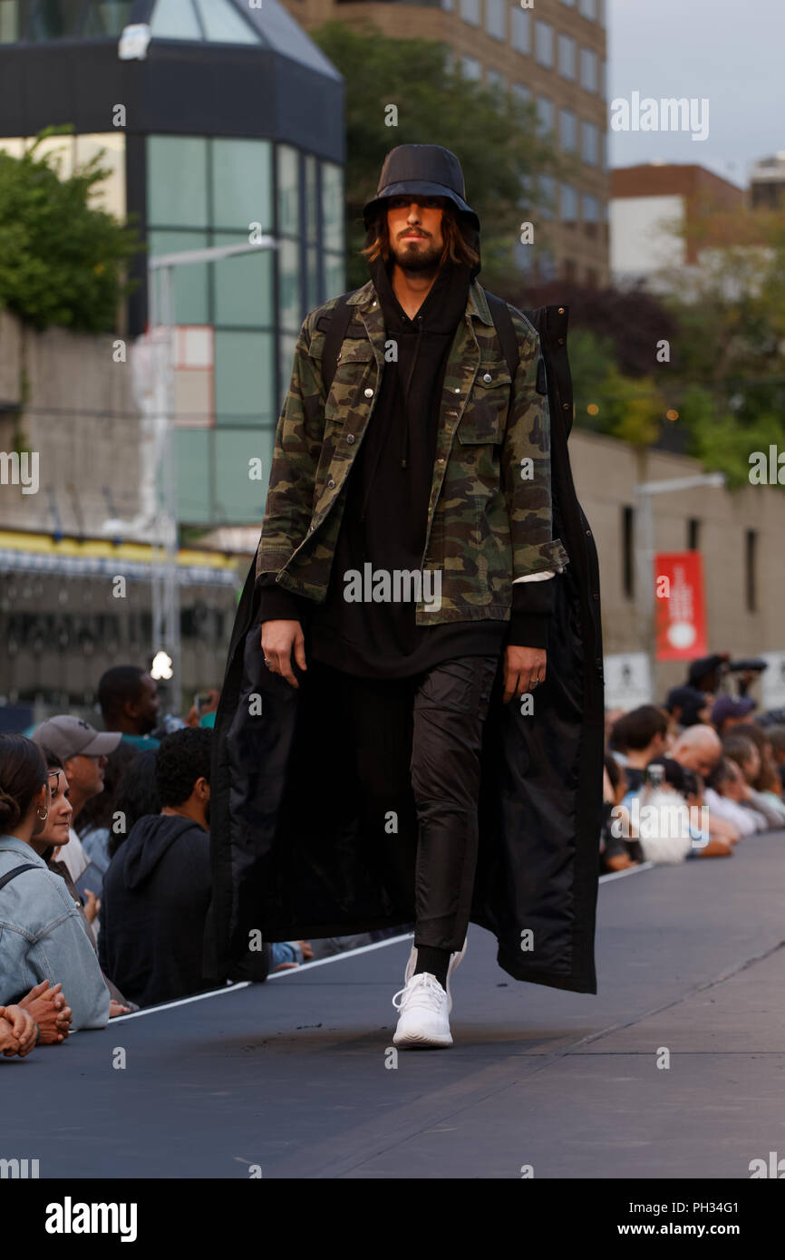 Montreal,Canada.  A model walks on the runway at the No Shelter fashion show held during the Fashion and Design Festival. Stock Photo