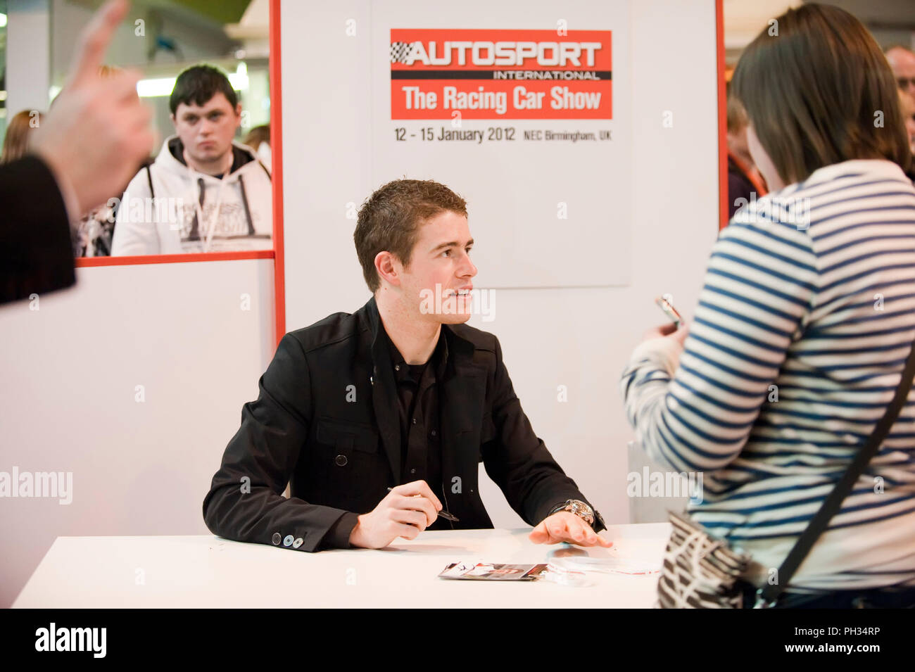 Paul di Resta Formula 1 driver signing autographs at Autosport ...