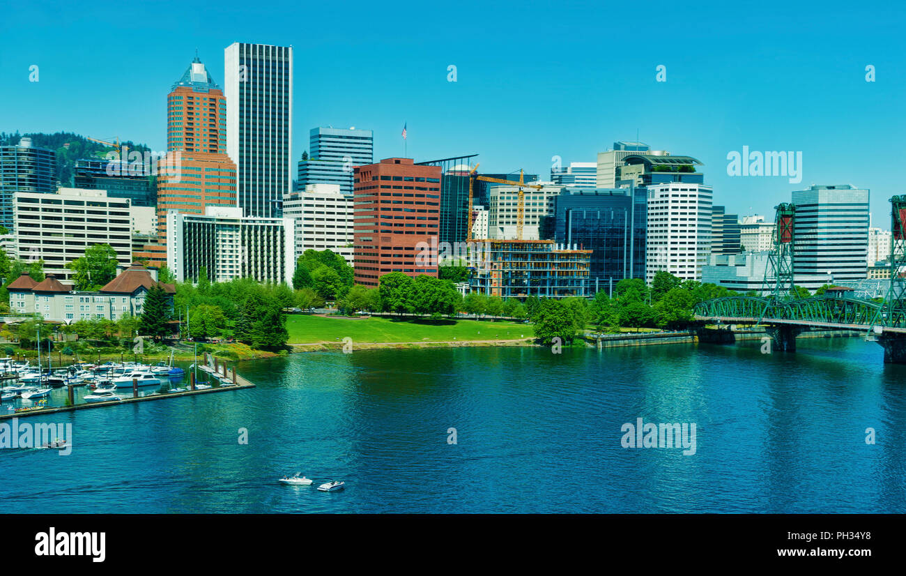 View of Portland, Oregon's skyline from the Marquam Bridge crossing the Willamette from a moving car. Stock Photo