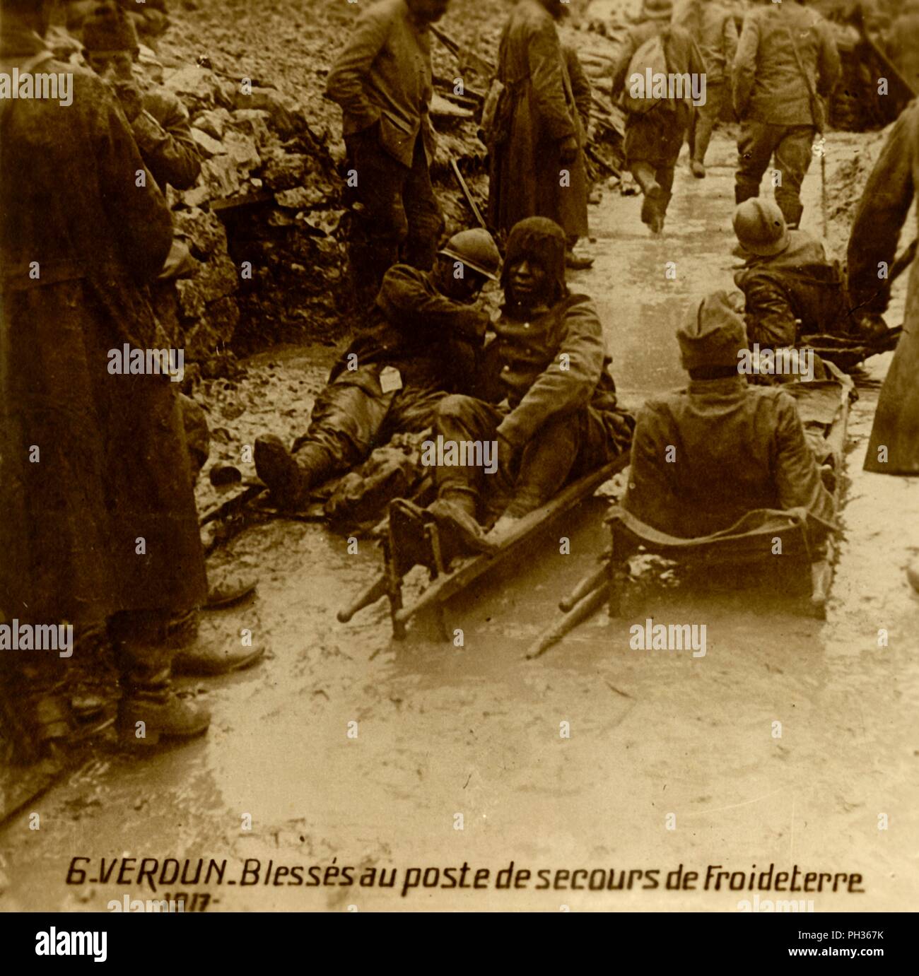 Injured soldiers at the first-aid post, Froideterre, Verdun, northern France, 1917. Artist: Unknown. Stock Photo