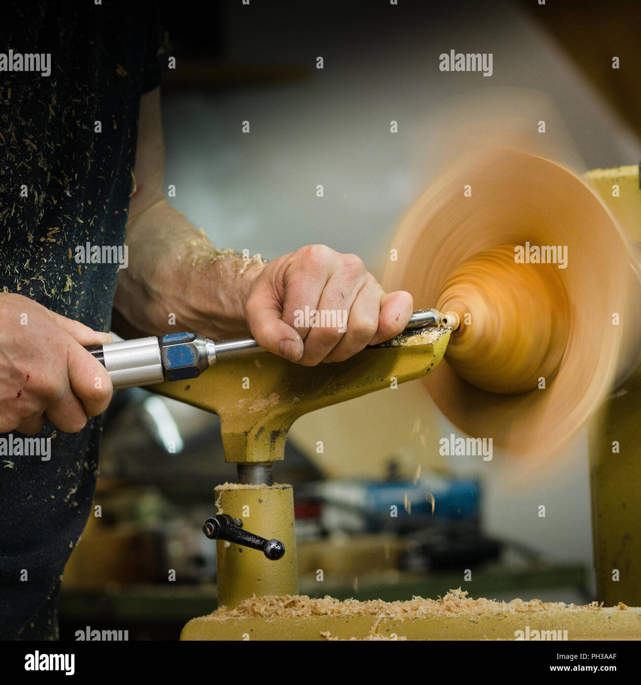 Turning wooden bowls on a lathe Stock Photo