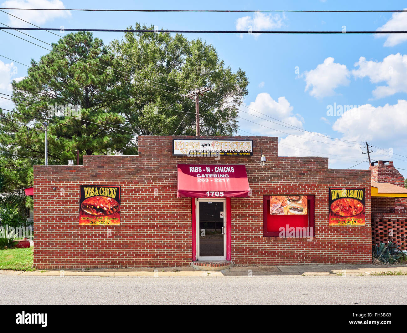 Front exterior entrance of a southern BBQ or barbecue restaurant in Montgomery Alabama, USA. Stock Photo