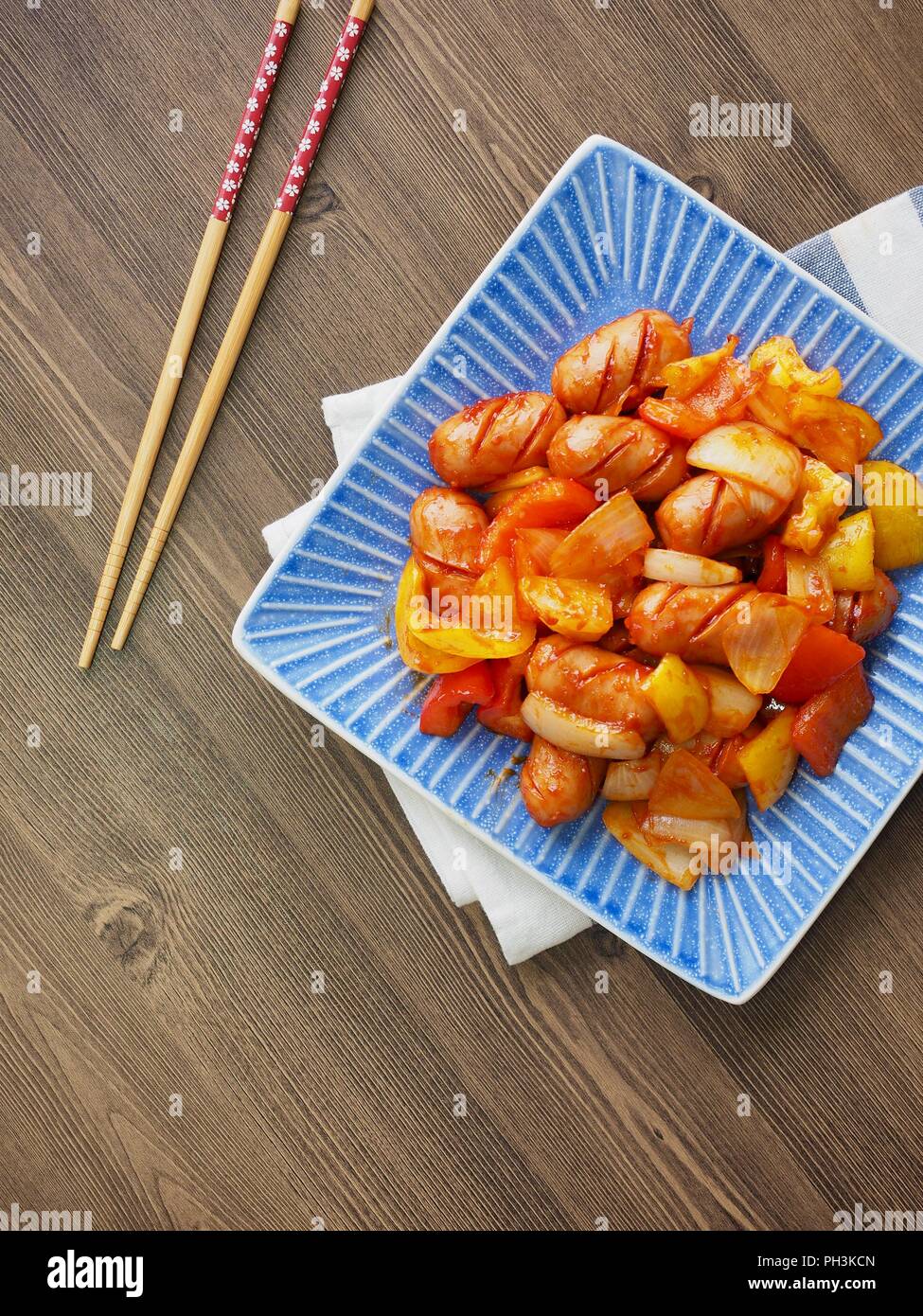 Korean food Sausage vegetables ketchup fried, Sausage stir-fried vegetables Stock Photo