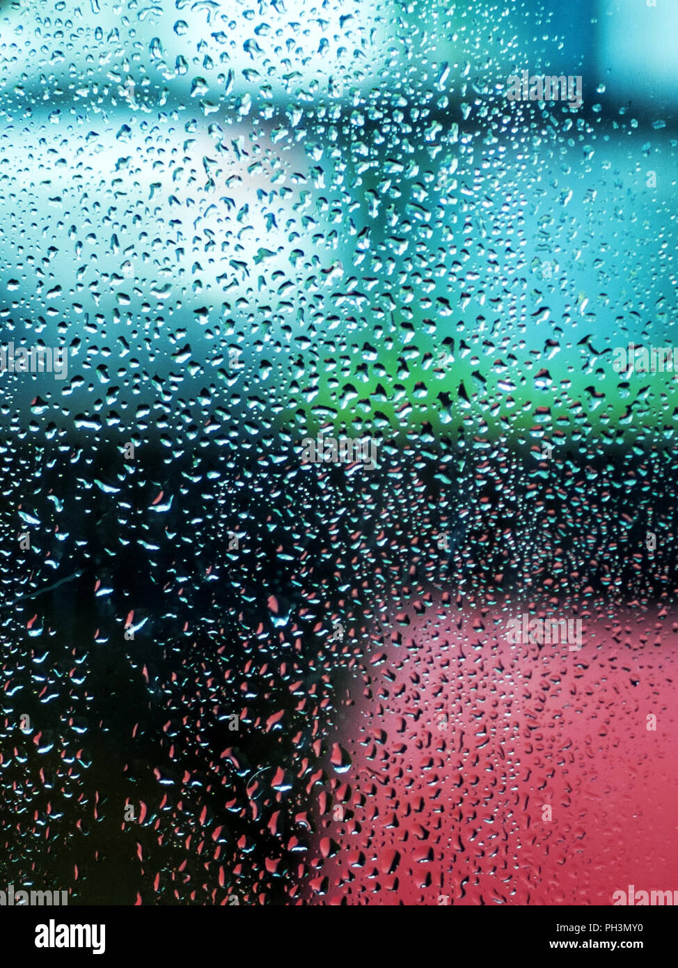 Rainy day, drops on glass window Stock Photo - Alamy