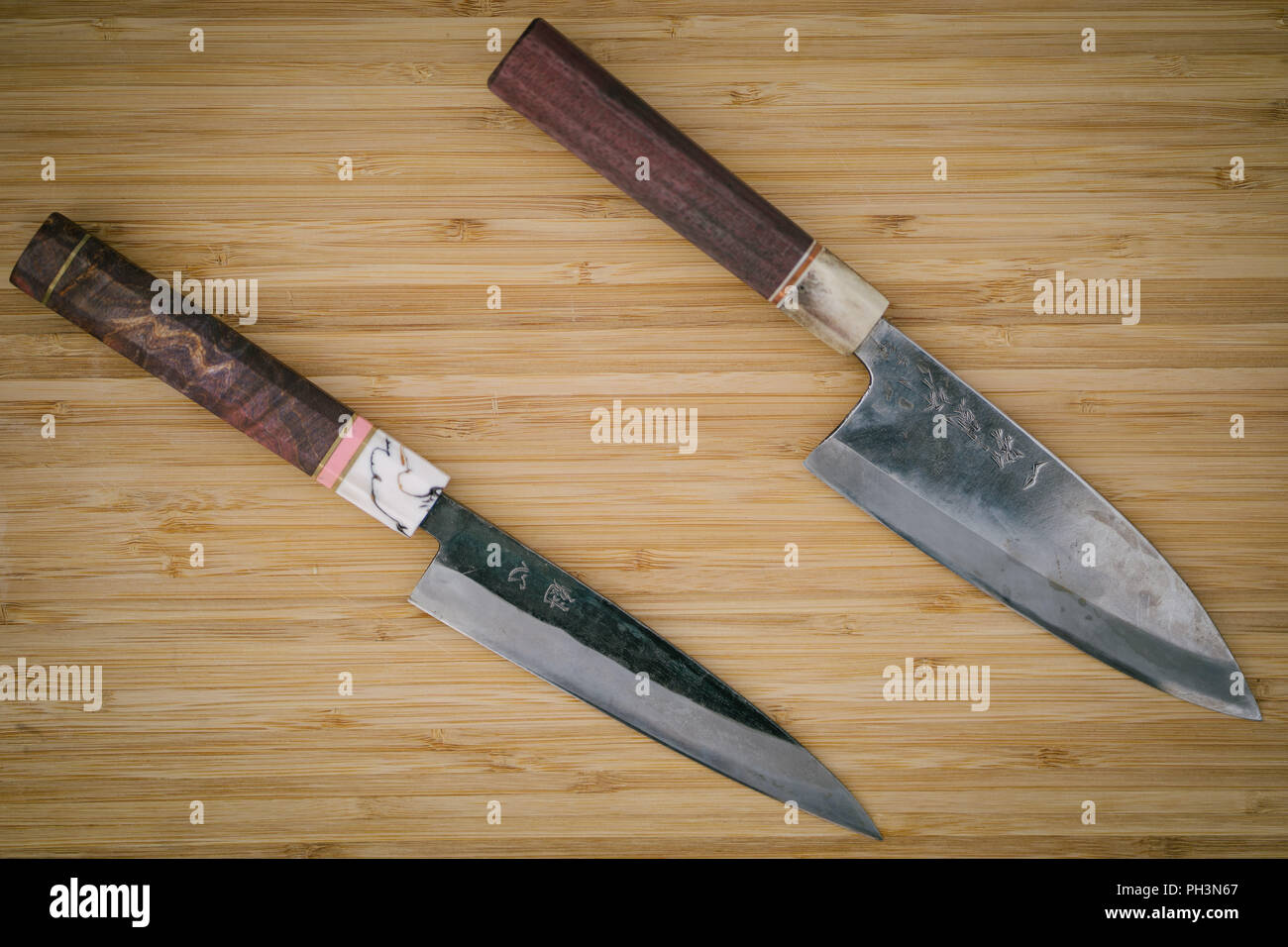 Japanese Handcrafted Sharp Damascus Steel Knives Cutting Board Stock Photo