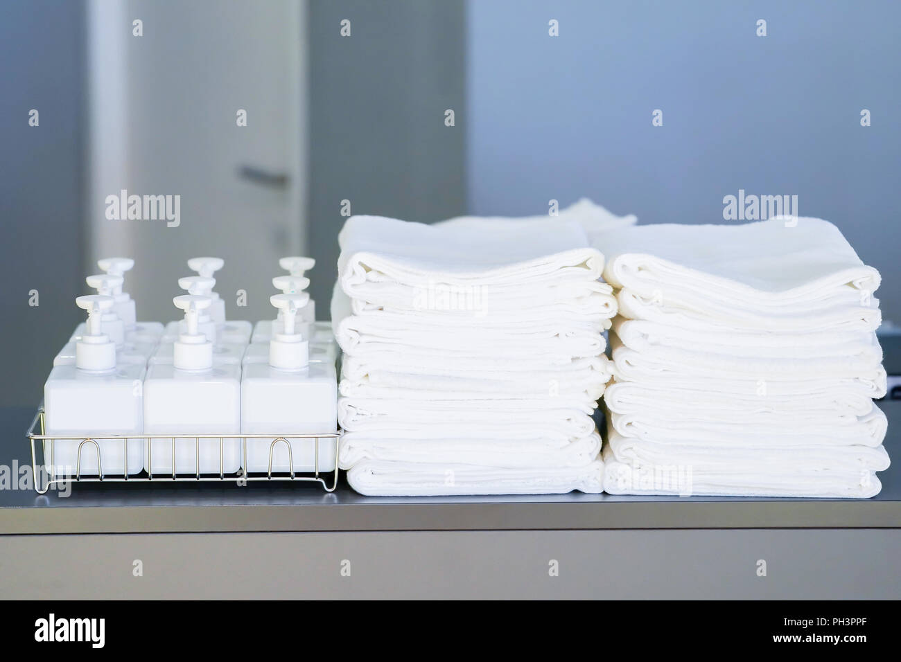 toiletries; shampoo, soap, conditioner and towel on the tourist counter