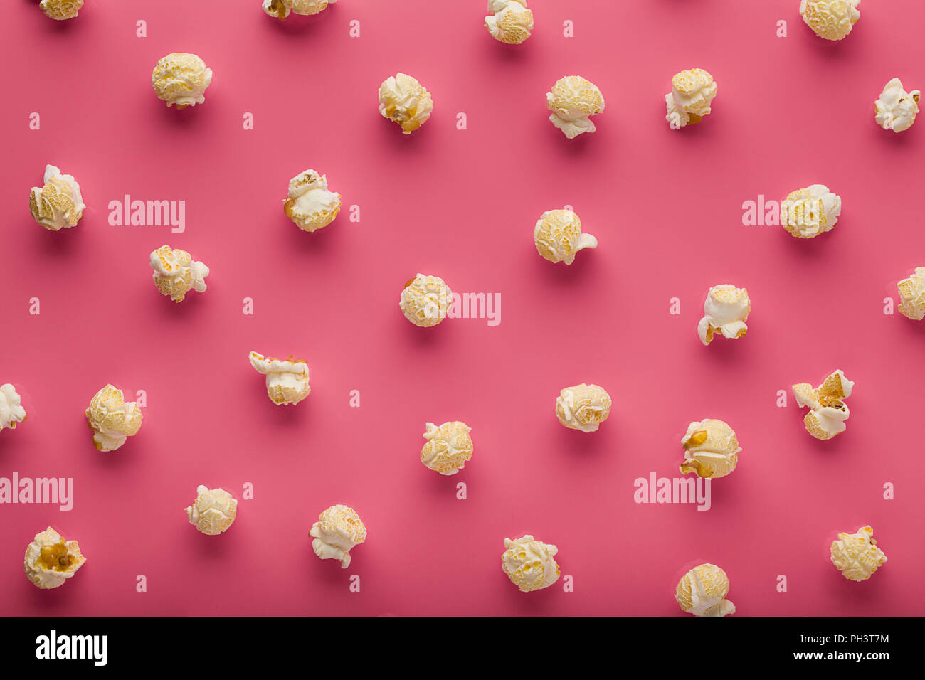 popcorn on a pink background Stock Photo